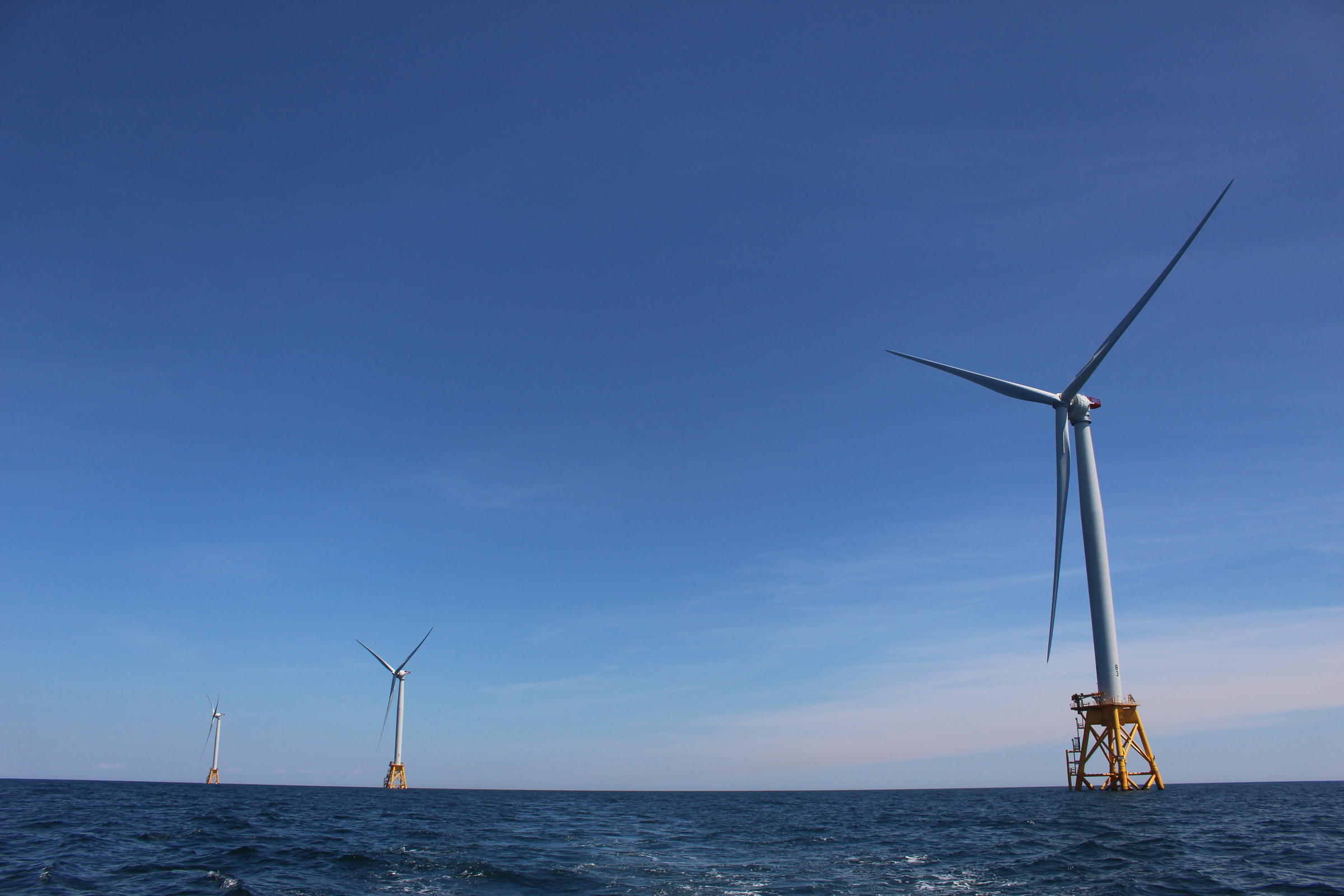 Three of five turbines that make up the Block Island Wind Farm, in waters three miles off the coast of Block Island. (Ambar Espinoza/RIPR)