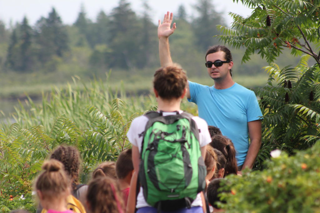 A teacher asks for volunteers during a class. (Jennifer Mitchel/MPBN)