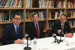 From left: Connecticut Gov. Dannel Malloy, U.S. Sen. Richard Blumenthal and East Hartford School Superintendent Nathan Quesnel. Photo by Anthony Brooks for WBUR