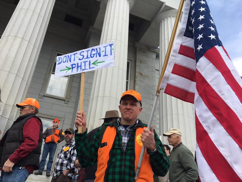 Justin Turco of Ira came to Montpelier to deliver a message to Gov. Phil Scott after the Legislature approved sweeping gun control legislation. Photo by John Dillon for VPR