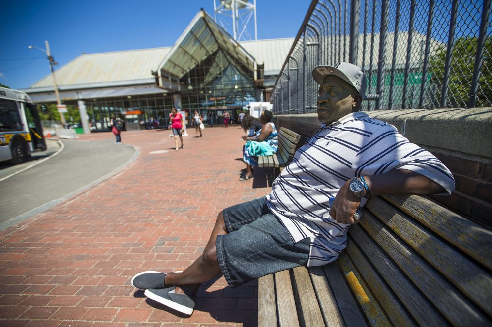 Clarence, 53, seen here by the Forest Hills MBTA station, says he's been addicted to heroin for 30 years. Photo by Jesse Costa for WBUR