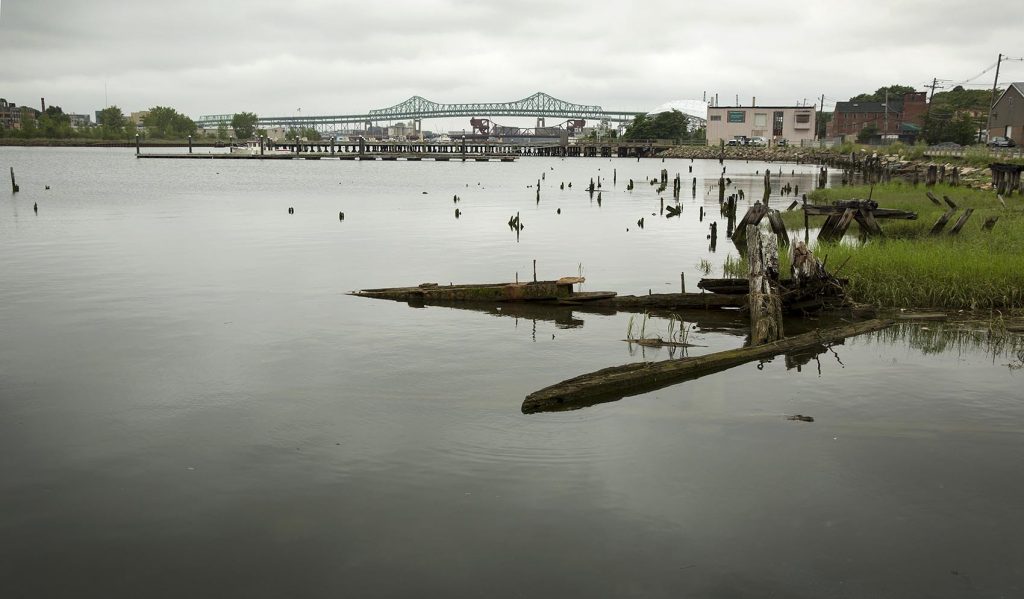 Several industrial sites are located on the Chelsea Creek in Chelsea, Massachusetts. Photo by Robin Lubbock for WBUR