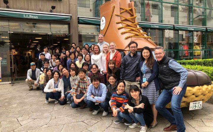 Zane Shatzer (front), managing director of Japan and Asia Pacific for L.L.Bean International, with his marketing team and the Japanese L.L.Bean Bootmobile, in the Kichioji section of Tokyo, where the L.L.Bean Japan branch office is headquartered. Courtesy of L.L. Bean