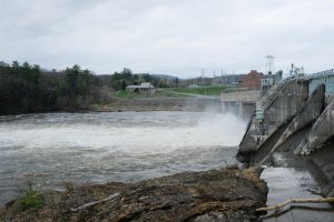 Whitewater rushes out of Wilder Dam, near Hanover, in early May. Photo by Britta Greene for NHPR
