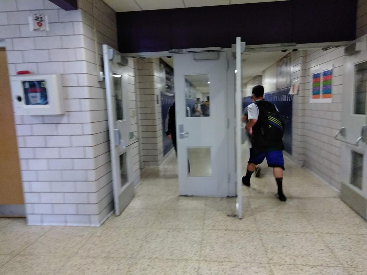 The bell rings and students hustle to get to class at Holyoke High School. Photo by Jill Kaufman for NEPR