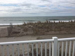 The porch of a cottage in the first row of houses along Roy Carpenter's Beach. This is one of the cottages that will be moved to the back in the next 2 years. Photo by Avory Brookins for RIPR