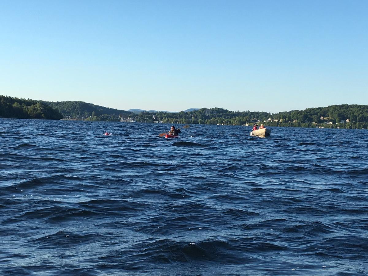 Vera Rivard, 14, accompanied by her mother Darcie in a kayak, and her father and sister in a boat, completed the marathon swim in 16 hours, 24 minutes. Photo by John Dillon for VPR