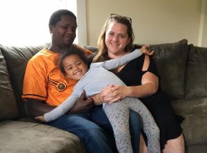 Carl Ronga, his wife Becky and their daughter Rehema. Photo by John Dillon for VPR