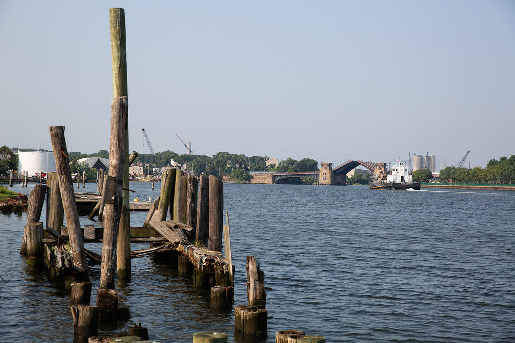 Oysterman Jay Fairty's radioed a morning call to raise the Ferry Street Bridge (seen in the distance). Fairty said the Quinnipiac River was good for business. "There's no better spot for oystering," Fairty said. "A lot of it's the water quality. The salinity. The food supply, everything is good here." Photo by Ryan Caron King for Connecticut Public Radio