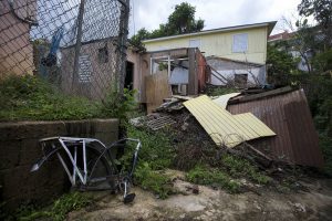 A house in Guaynabo, which was completely leveled by Hurricane Maria, still sits in ruin one year after the storm. Photo by Jesse Costa for WBUR