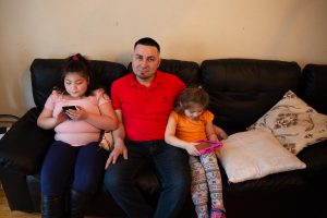 Jose Zabala and his daughters. Photo by Ryan Caron King for Connecticut Public Radio