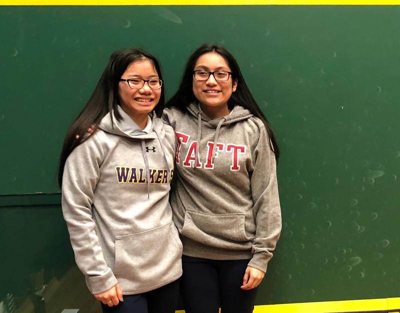 Hartford teens Ku Paw, left, and Julissa Mota celebrate after getting accepted to Connecticut boarding schools. Opportunities came after they began playing squash a few years ago through the Capitol Squash program hosted at Trinity College in Hartford. Photo by Vanessa de la Torre for Connecticut Public Radio