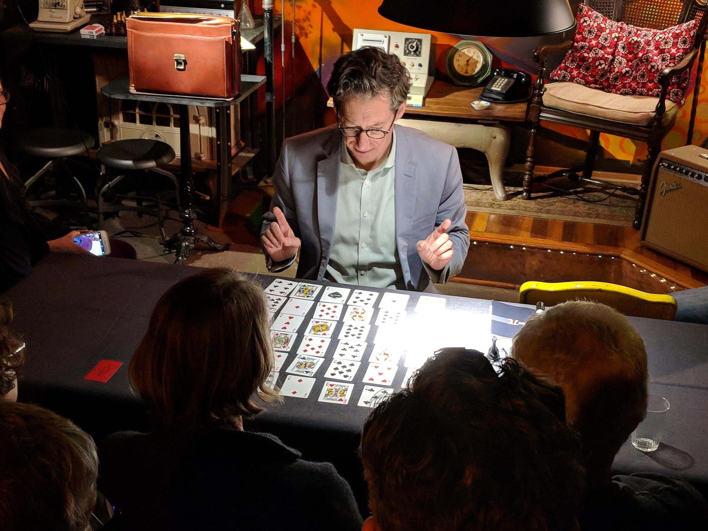 Alexander George, by day a philosophy professor, by night a mentalist or mind reader. He hosts sessions at a cafe in Northampton, Mass. Photo by Tom Wood for NEPR