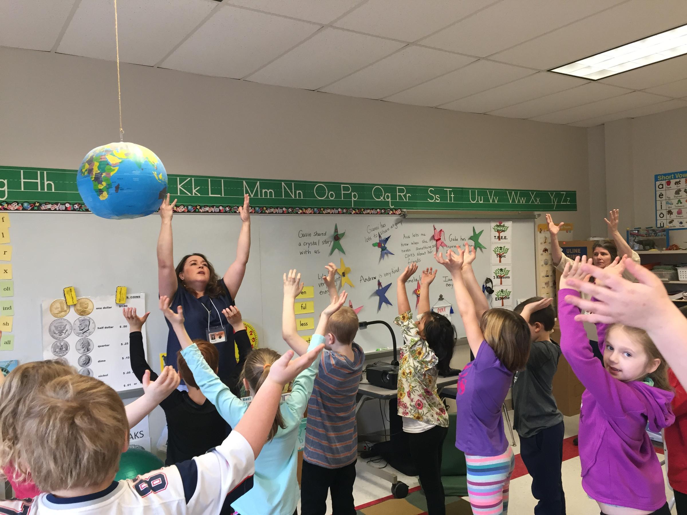 Teacher Jessica Pollard at Lee Elementary School leads her class in a mindfulness exercise. Photo by Karen Brown for NEPR