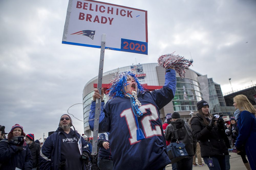 Sandra Balfe of Wrentham sports red, white and blue hair and beads at a fan sendoff at Gillette Stadium before the 2017 Super Bowl. Photo by Jesse Costa for WBUR