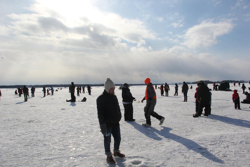 Hundreds of people walked out onto frozen Lake Champlain in North Hero for the sixth annual Ice Fishing Festival on Saturday. Photo by Bayla Metzger for VPR