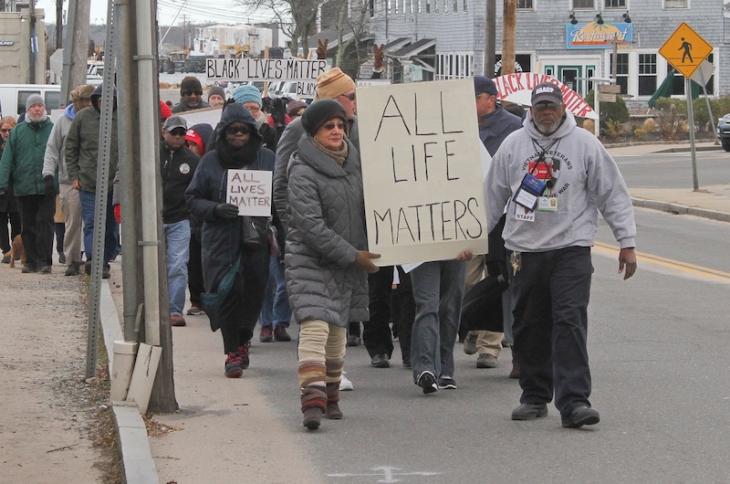 Richard Shepard and Joyce Rickson lead the way during NAACP organized march. January 2015. Vineyard Haven, MA. Photo by Ivy Ashe.