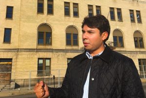 Jasiel Correia stands in front of the city’s former police station, in this 2016 file photo. Photo by Simon Rios for WBUR