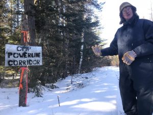 CMP's proposed transmission line would cross right over the trail Duane Hanson uses to get to his off-the-grid home near the Canadian border. Photo by Fred Bever for Maine Public