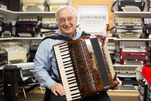 Angelo Paul Ramunni in his New England Accordion Connection and Museum. Photo by Carlos Mejia for the New England News Collaborative