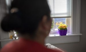 Maria Merida has been living in “sanctuary” in a Boston-area church for more than a year. She has a final order of removal back to her native Guatemala but is hoping to apply for asylum to stay in the U.S. She says she rarely leaves the confines of the church. Photo by Robin Lubbock for WBUR