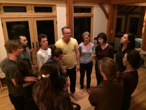 Bennett Konesni leads a chantey in Northport. Photo by Ari Snider for Maine Public