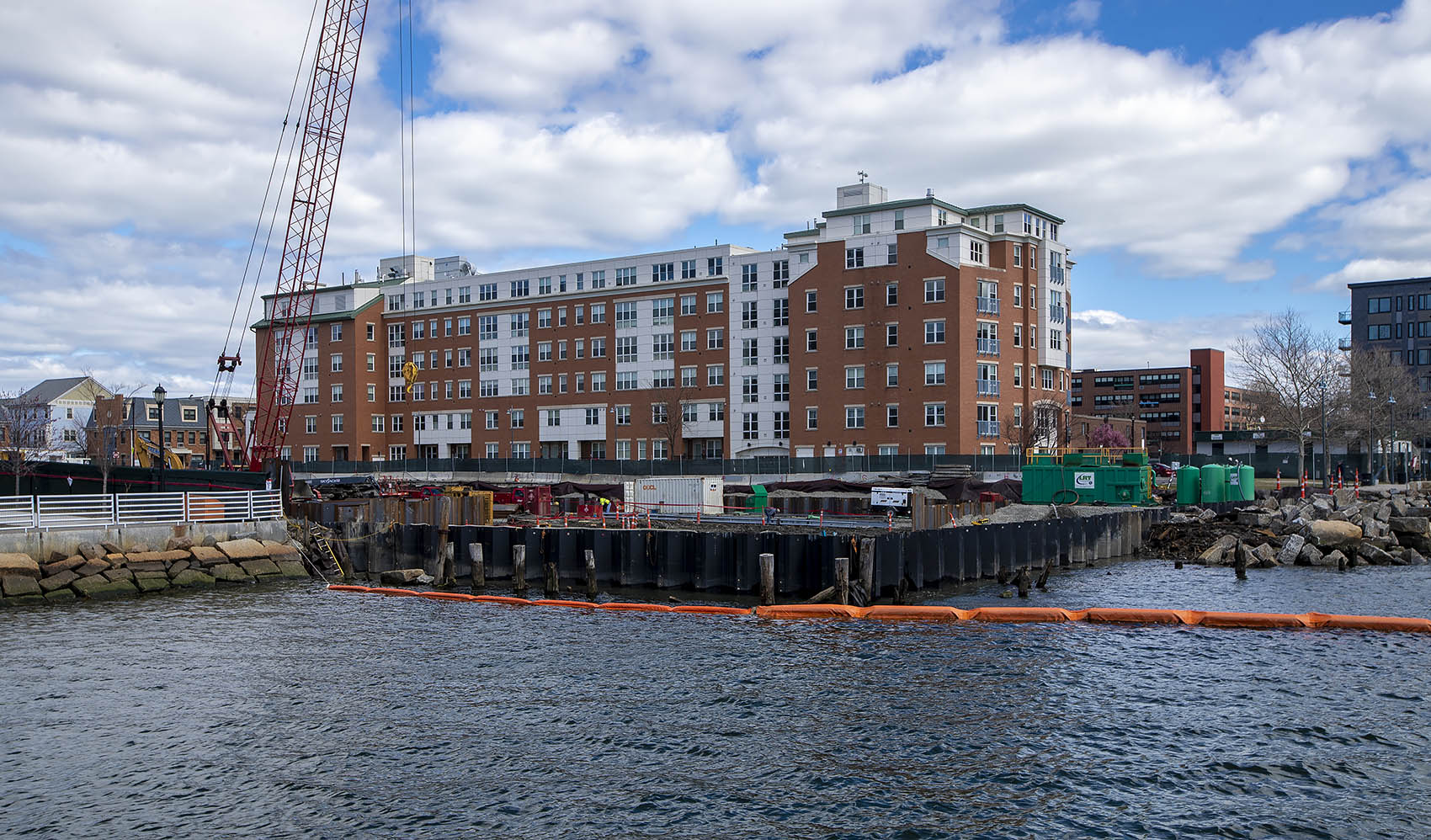 The 99 Sumner Street construction site in East Boston sits between LoPresti Park and Carlton Wharf. Photo by Jesse Costa for WBUR