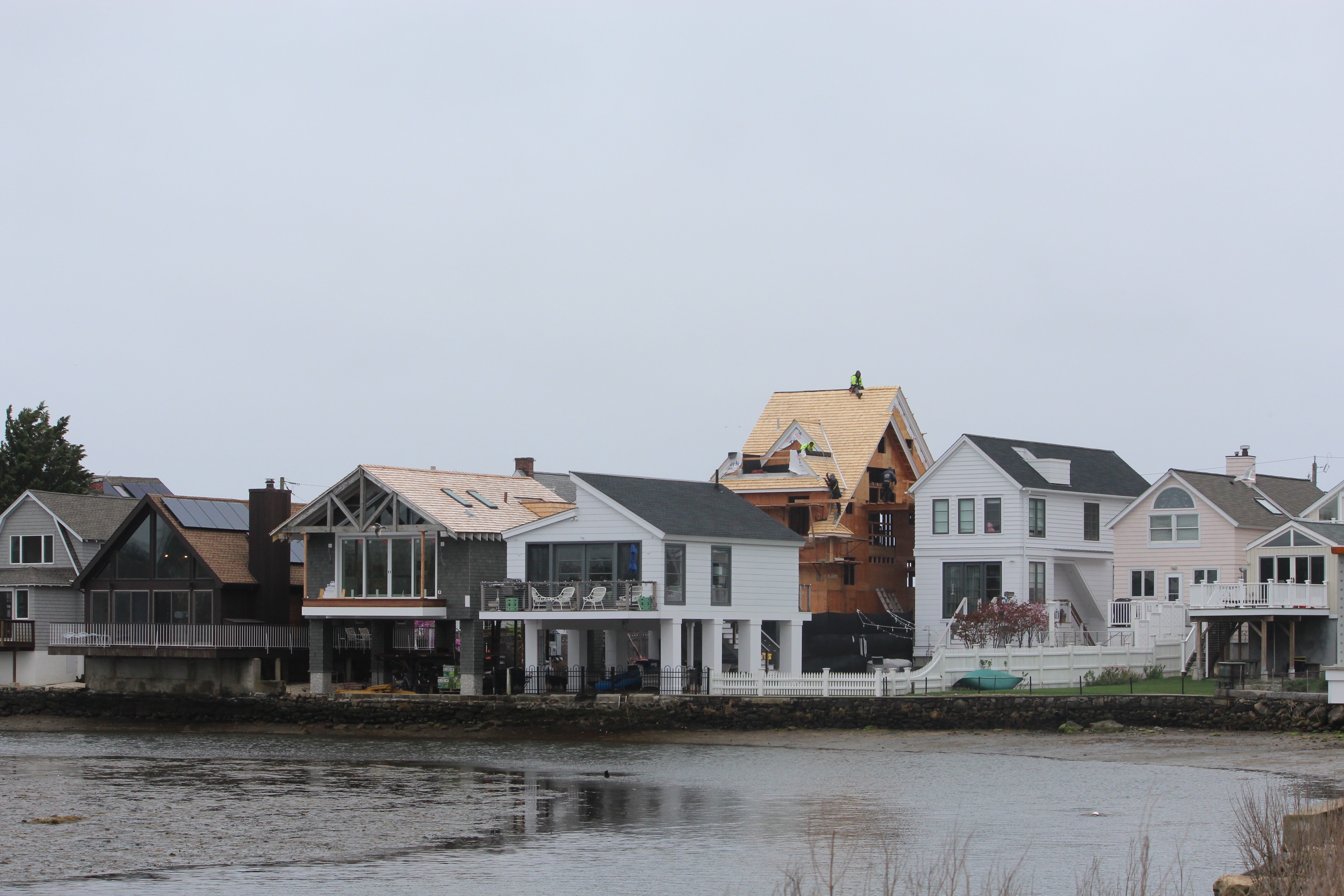 Construction of a multi-million dollar beach-front property in Westport. Photo by Jacqueline Rabe Thomas for the Connecticut Mirror.