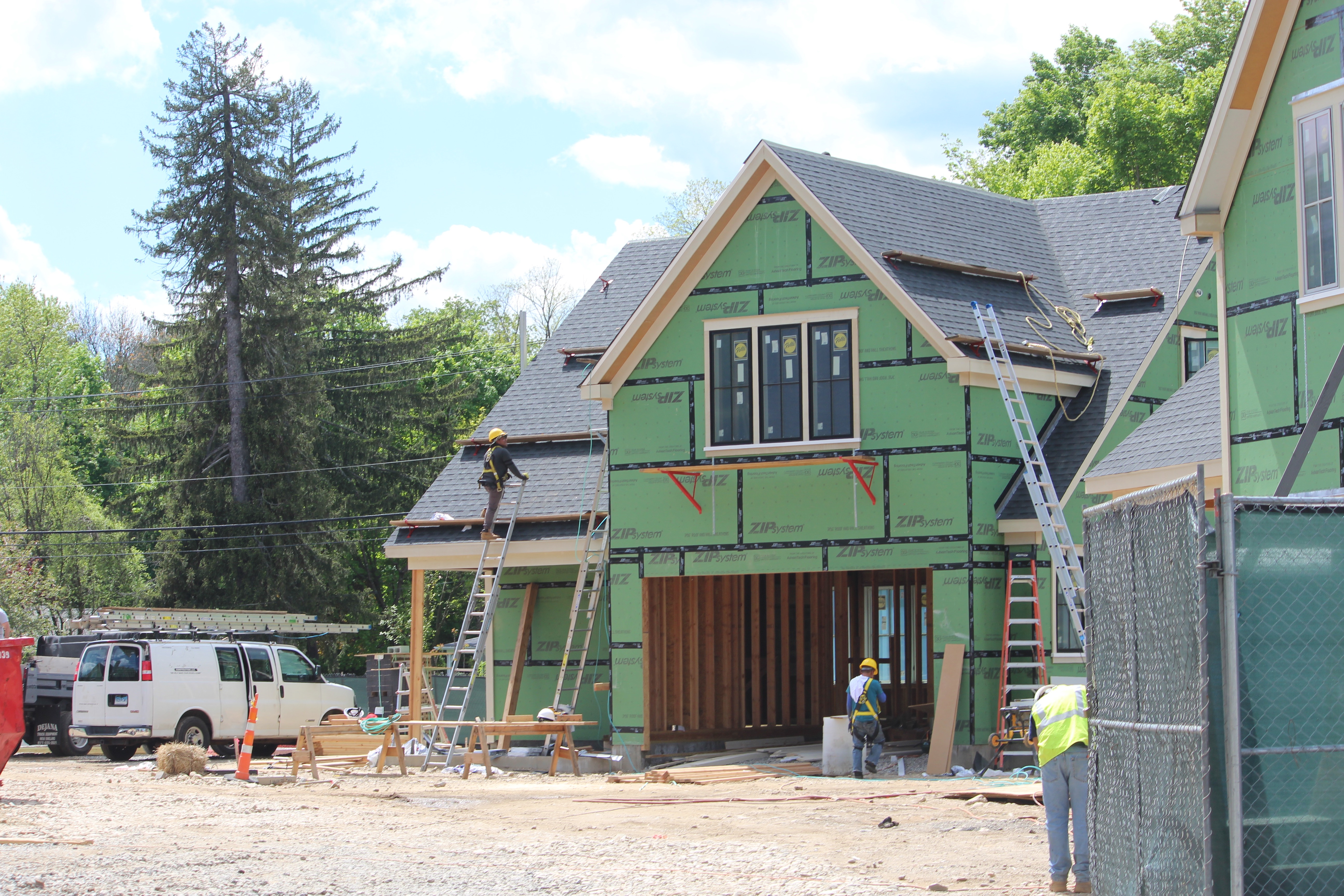 Housing being constructed in Westport that are expected to sell for $1.2 million. Photo by Jacqueline Rabe Thomas for the Connecticut Mirror.