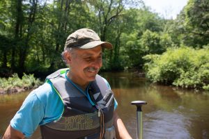 Wildlife biologist Peter Picone, above, has spent much of his life paddling the Quinnipiac. "It’s an adventure," he said. "Every bend has something different." Photo by Patrick Skahill for WNPR.