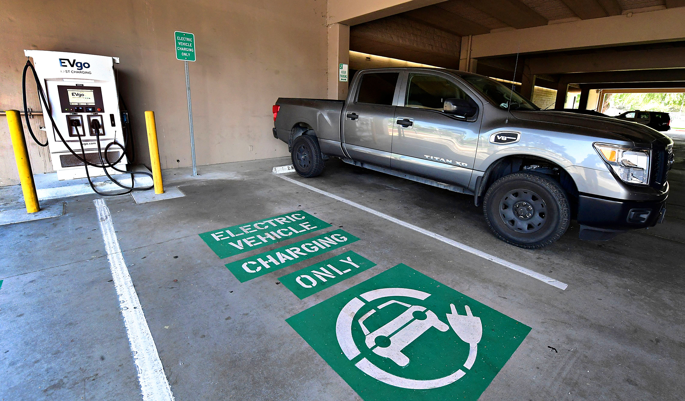 A space remains open for an electric vehicle at a EV charging station in Monterey Park, California on May 18, 2021.