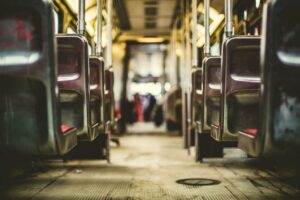 Aisle between rows of bus seats