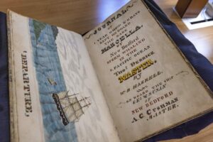 The log book of the whaling vessel Marcella out of New Bedford at the Providence Public Library, which owns one of the five largest collections of whaling log books in the country.