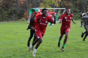 Jeannot Ndayishimiye, center, celebrates after scoring a goal for Burundi in the final minutes of the match.