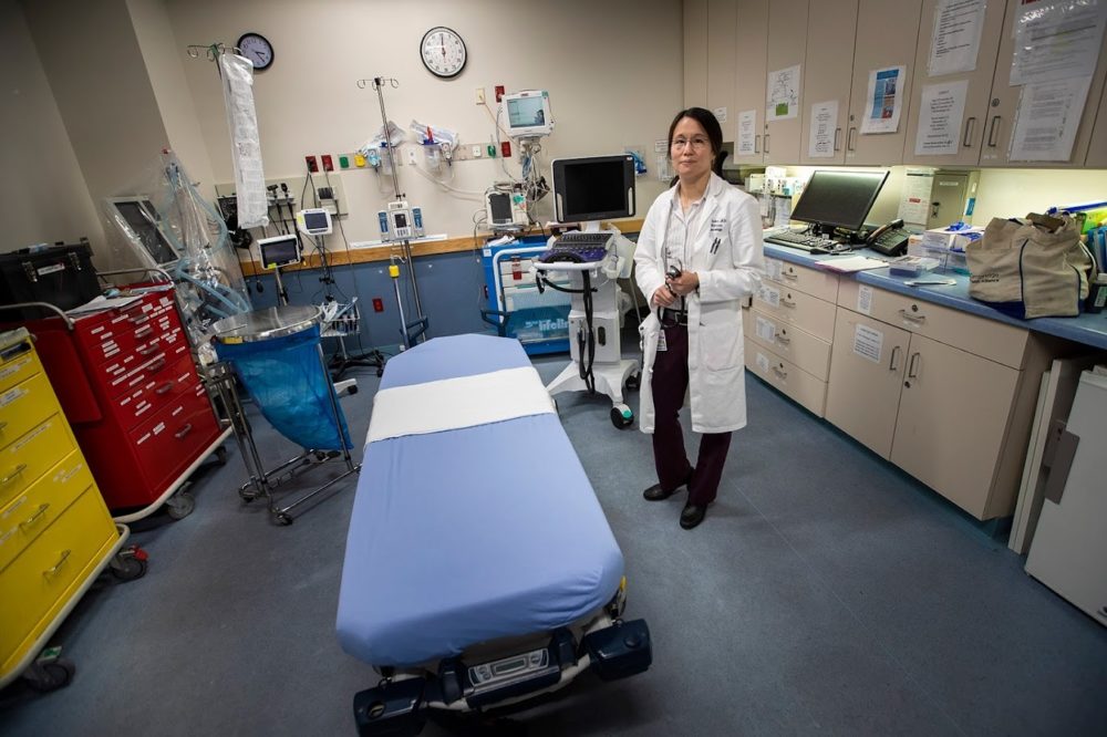 Dr. Melisa Lai-Becker, chief of the emergency department at Cambridge Health Alliance Hospital in Everett, stands in one of the resuscitation rooms in the emergency ward of the hospital.