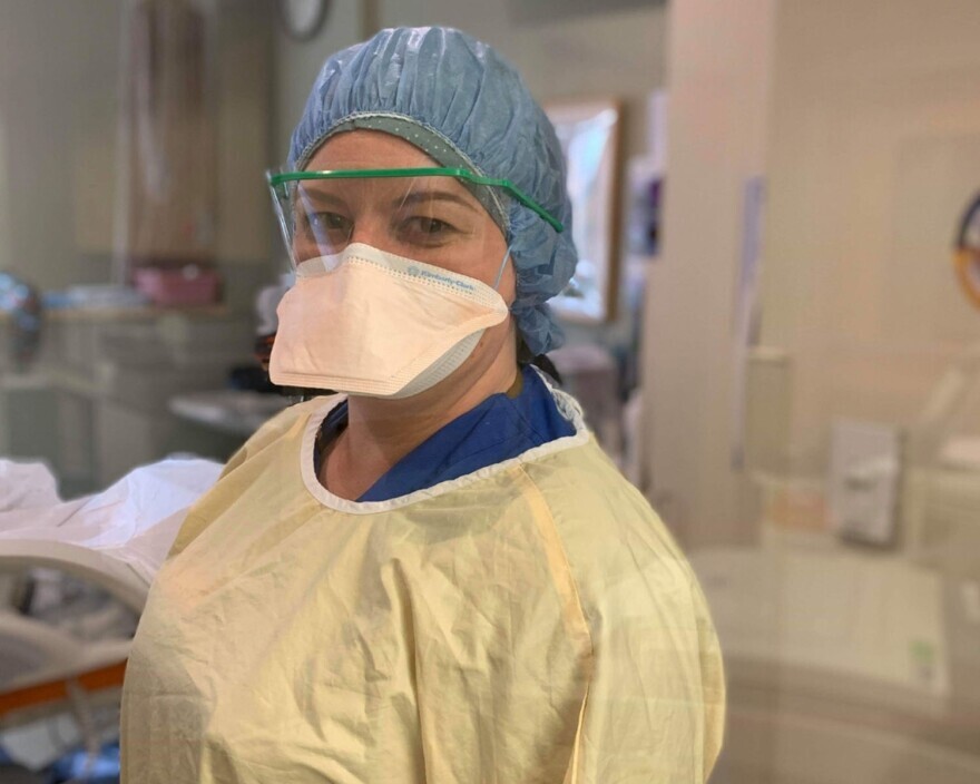 A photo of ICU nurse Cynthia Dalton in full scrubs and mask. Dalton works at Mid Coast Hospital in Brunswick, Maine, and recorded daily audio diaries over the course of a recent week in January 2022.