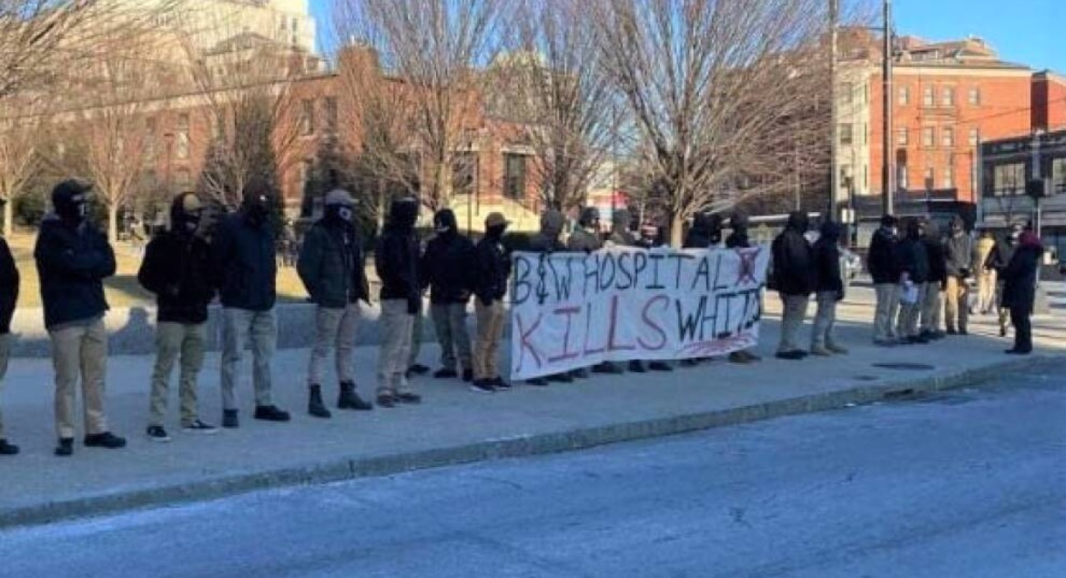 White nationalist protesters gather outside Brigham and Women's Hospital during a rally Jan. 22, 2022.