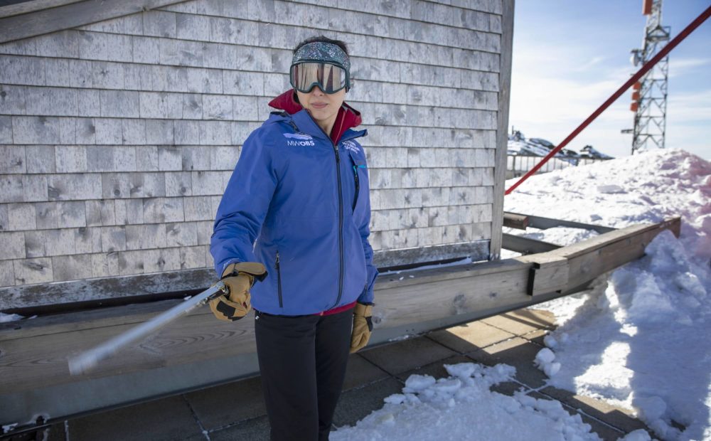 On the roof of the observatory weather observer Jackie Bellefontaine spins a sling psychrometer to measure relative humidity. 