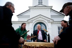 The Unity of Nations drum group plays a traditional Mohegan song before a repatriation ceremony at the Mohegan Congregational Church in Uncasville, Conn. After more than 200 years, Dartmouth College has returned the handwritten papers of 18th-century Mohegan scholar Samson Occom to the Mohegan Tribe. Occom traveled to Europe in the 1760s to raise funds for what he believed would be a school in Connecticut for Native American students. But after he returned, he learned that the funds were diverted toward the founding of a school for white settlers that would later become Dartmouth.