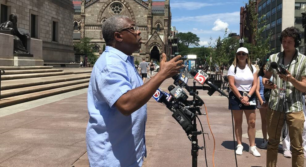 Peter OPara, chairman of the New Democracy Coalition, speaks at a press conference about the recent white supremacist march in Boston, outside the Boston Public Library on July 4, 2022. 