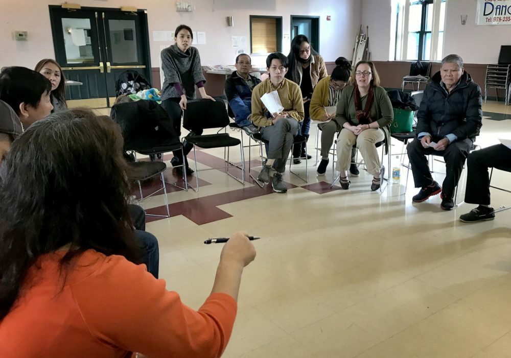 Vietnamese immigrants attended a public forum at VietAid in Dorchester to learn more about changes to immigration policies under President Donald Trump. (Shannon Dooling/WBUR)