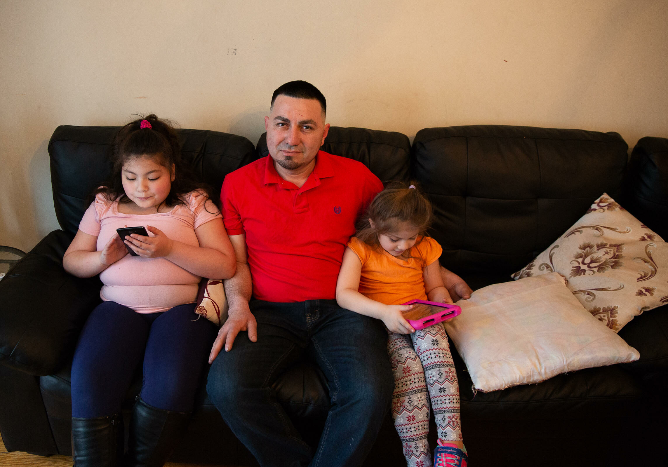 Jose Zabala and his daughters. Photo by Ryan Caron King for Connecticut Public Radio