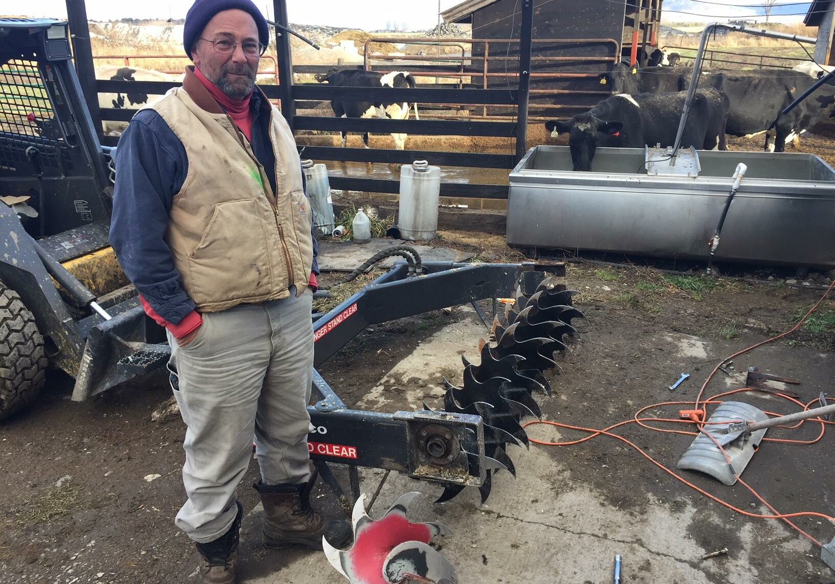 West Addison dairy farmer Rob Hunt has employed migrant workers for more than a decade. He says they have been vital to the success of his operation, and he's worried about their future. Photo by John Dillon for VPR
