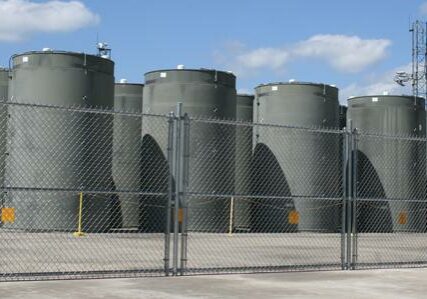 Spent fuel at Vermont Yankee is stored in these casks. NorthStar, the company that wants to buy the closed plant, recently boosted its financial plan to pay for fuel storage. Photo courtesy of Vermont Yankee