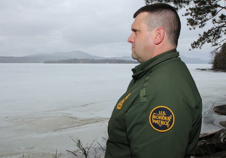 U.S. Border Patrol agent Richard Ross near the international border along Lake Memphremagog. Photo by Lorne Matalon for VPR