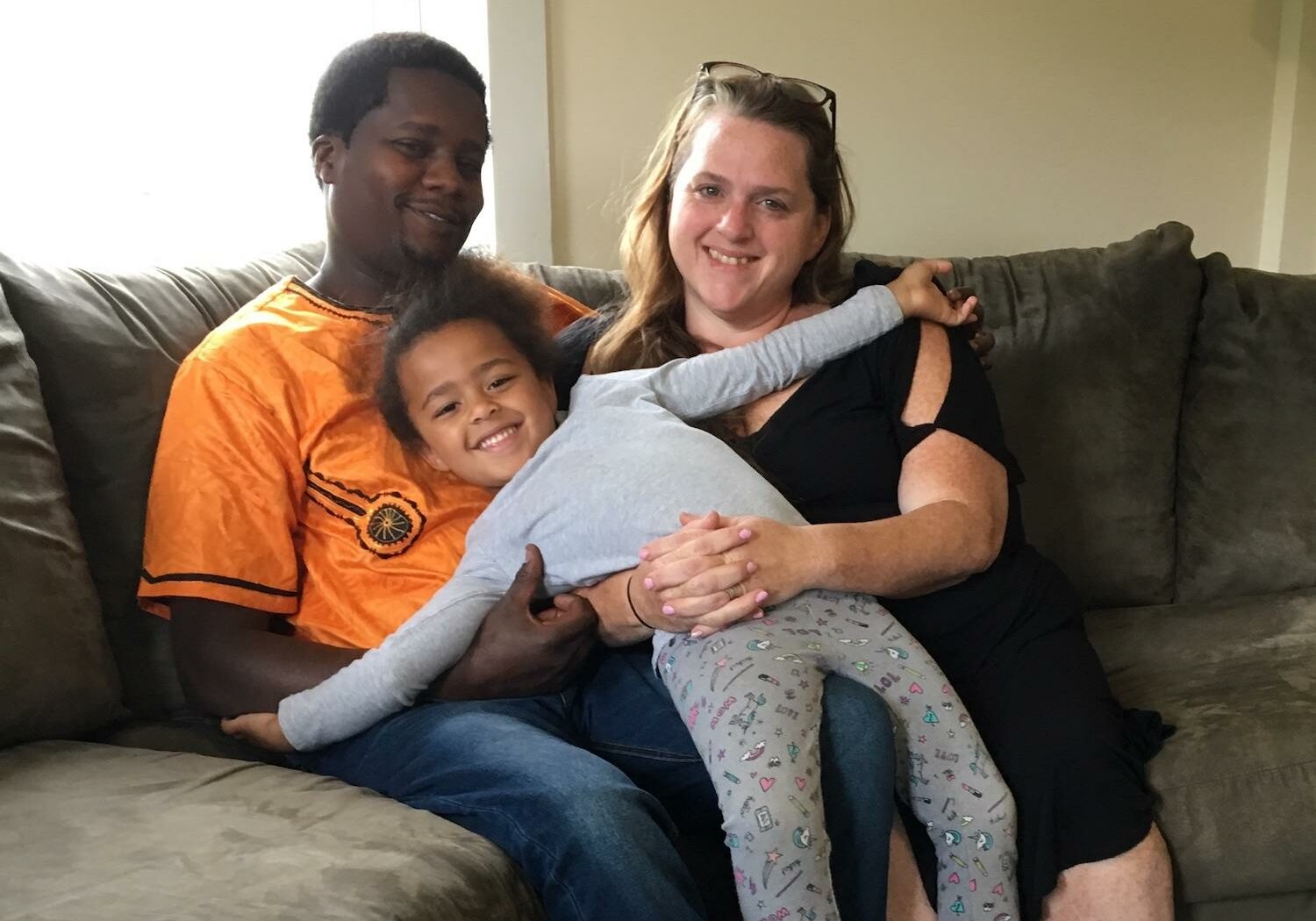 Carl Ronga, his wife Becky and their daughter Rehema. Photo by John Dillon for VPR